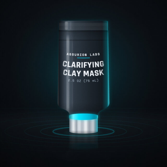 Frosted tube of Assurion Labs Clarifying Clay Mask on a dark background