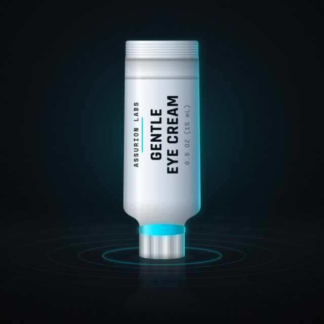 Slim frosted tube of Assurion Labs Gentle Eye Cream on a dark background