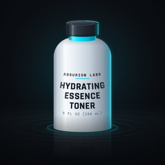Frosted glass toner bottle of Assurion Labs Hydrating Essence Toner on a dark background