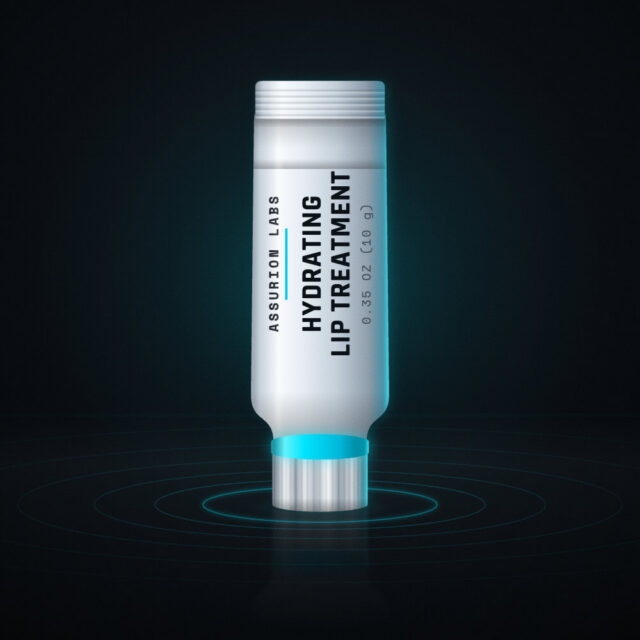 Slim frosted squeezable tube of Assurion Labs Hydrating Lip Treatment on a dark background