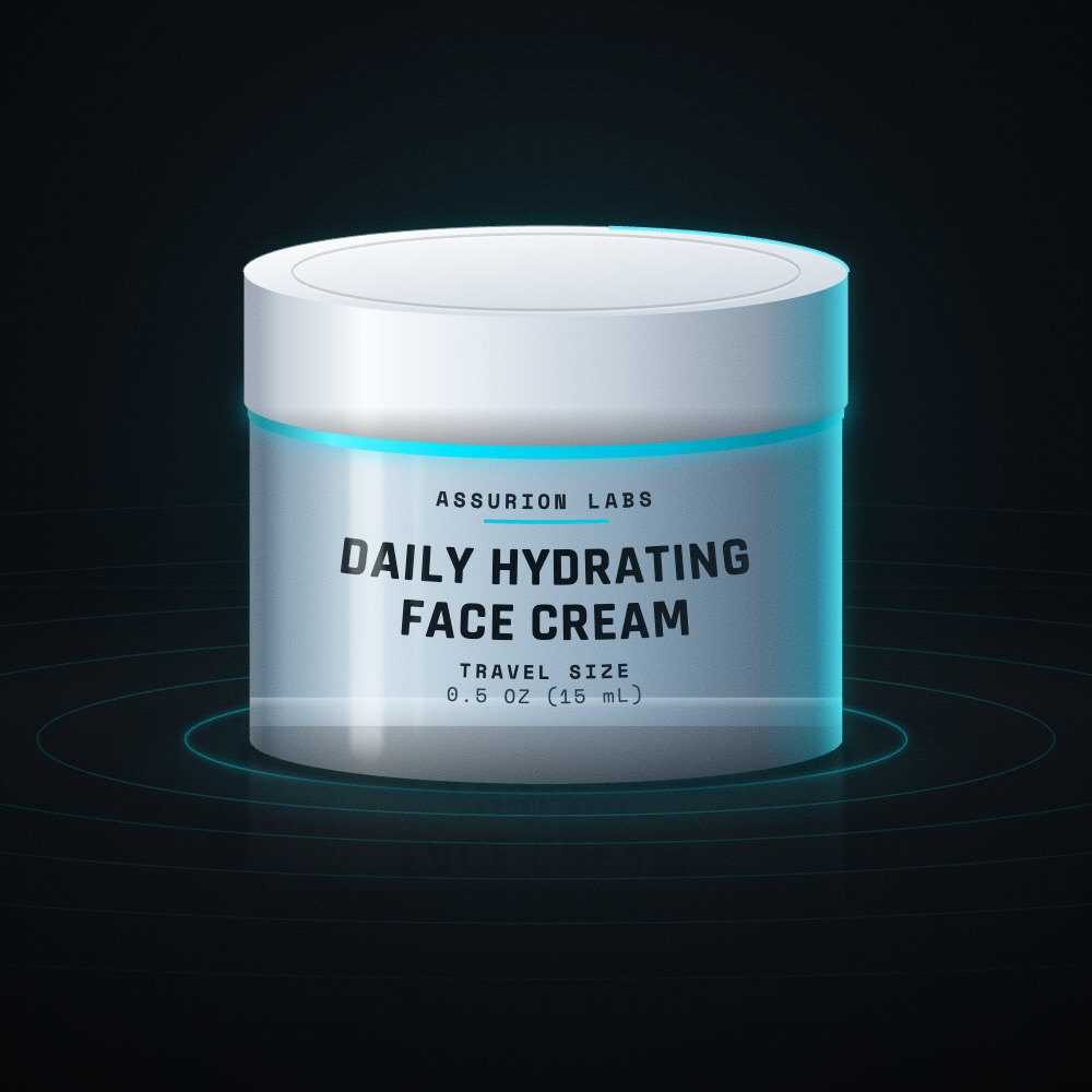 Mini frosted glass jar of Assurion Labs Travel Size Daily Hydrating Face Cream on a dark background